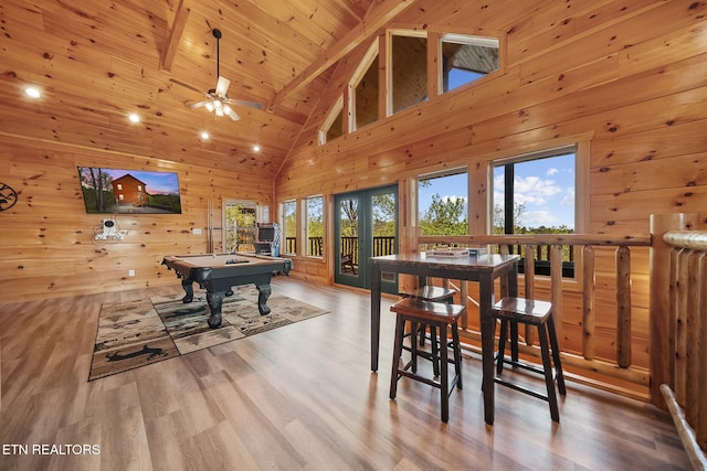 recreation room with pool table, wooden walls, wood finished floors, wooden ceiling, and beamed ceiling