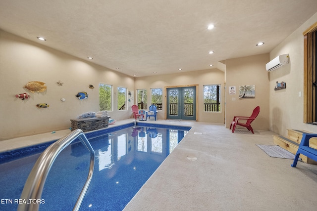 pool with an AC wall unit and french doors