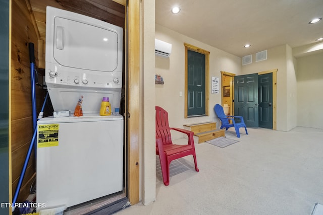 washroom with laundry area, visible vents, an AC wall unit, stacked washing maching and dryer, and recessed lighting