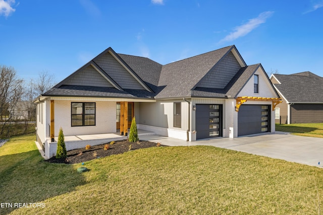 view of front of property with a garage, driveway, a shingled roof, a porch, and a front lawn