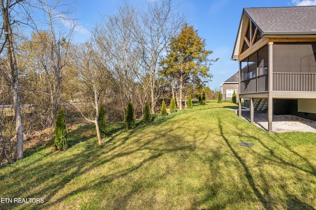 view of yard with a sunroom