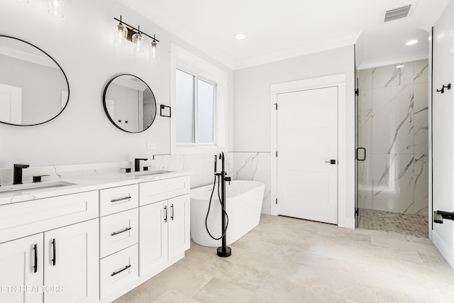 full bath featuring a marble finish shower, double vanity, visible vents, a sink, and a freestanding tub