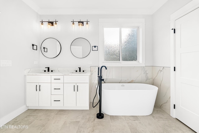 bathroom featuring a soaking tub, a sink, tile walls, and double vanity