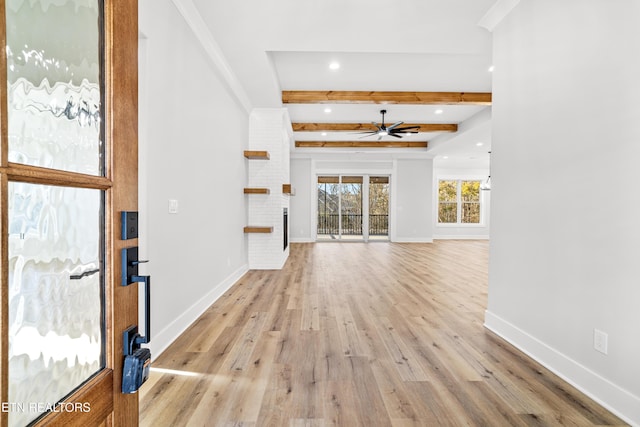 unfurnished living room with recessed lighting, a ceiling fan, baseboards, light wood-style floors, and beamed ceiling