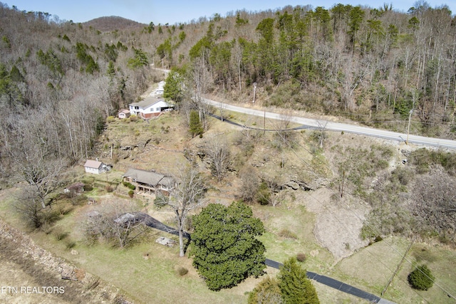 drone / aerial view with a forest view