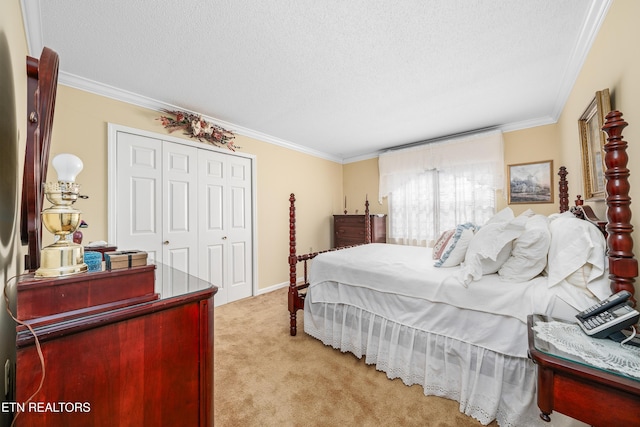 bedroom featuring a closet, light colored carpet, a textured ceiling, and crown molding