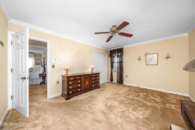 bedroom with a closet, light carpet, and ornamental molding