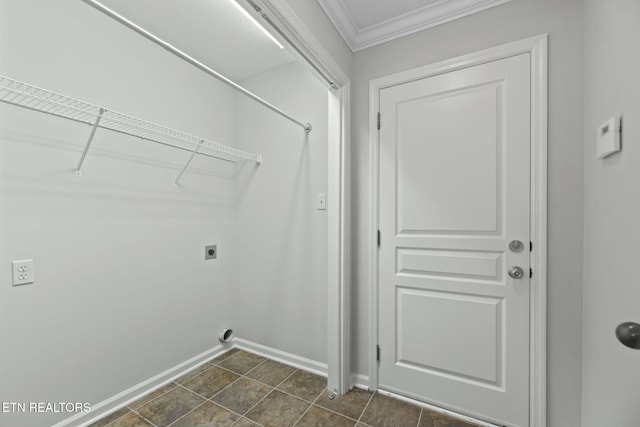 laundry area featuring laundry area, hookup for an electric dryer, baseboards, and ornamental molding