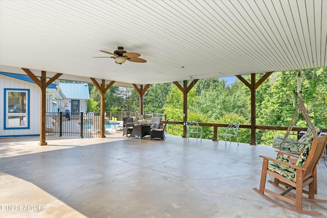 view of patio / terrace featuring a ceiling fan and fence