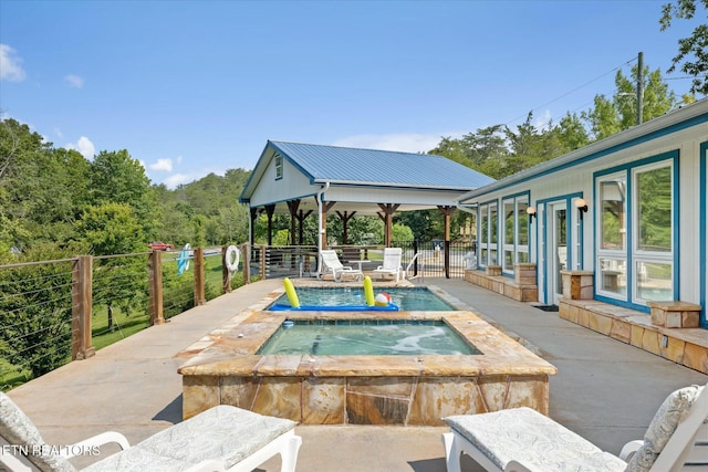 view of pool featuring a fenced in pool, a patio, an in ground hot tub, fence, and a gazebo