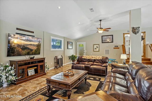 living room featuring vaulted ceiling, ceiling fan, visible vents, and baseboards