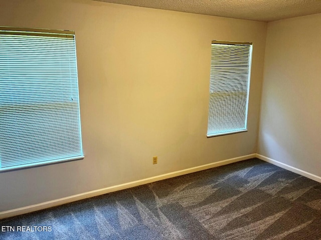 2442 Chastity Way, Knoxville, TN 37909 - empty room featuring dark carpet and baseboards