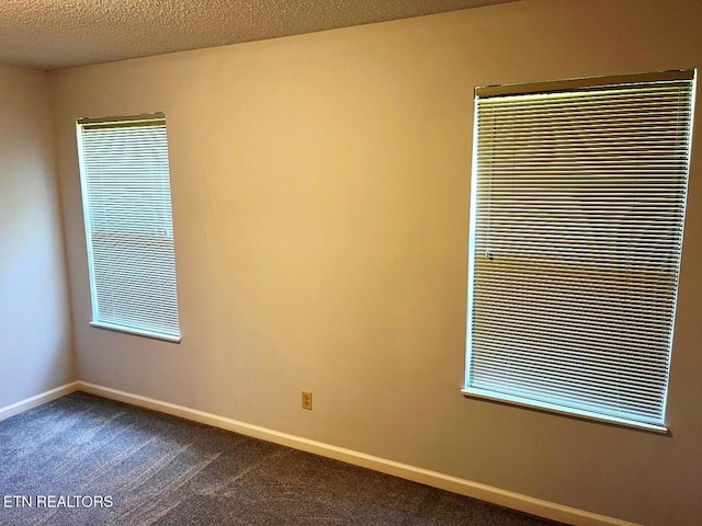 2442 Chastity Way, Knoxville, TN 37909 - empty room with dark colored carpet and baseboards