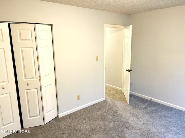 2442 Chastity Way, Knoxville, TN 37909 - unfurnished bedroom featuring carpet flooring, a closet, a textured ceiling, and baseboards