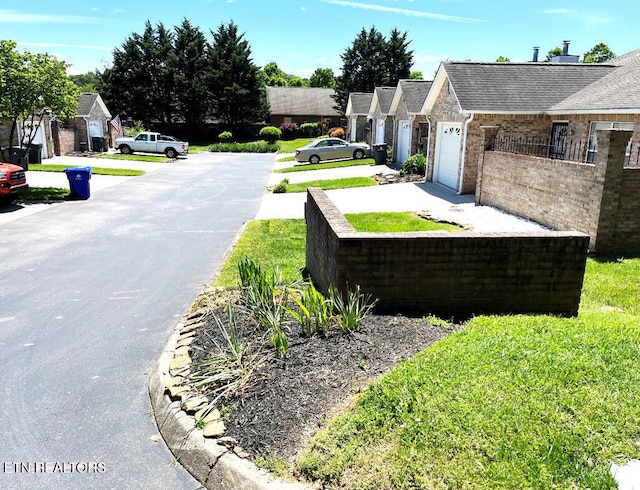 2442 Chastity Way, Knoxville, TN 37909 - view of yard with concrete driveway and a garage