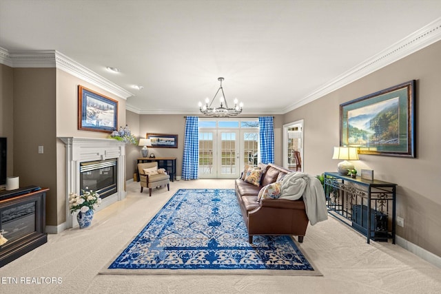 living area featuring baseboards, a glass covered fireplace, ornamental molding, french doors, and carpet floors