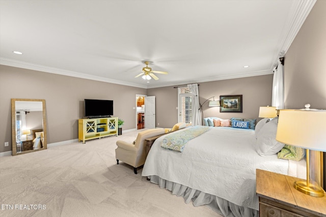 bedroom featuring baseboards, ornamental molding, a ceiling fan, and light colored carpet