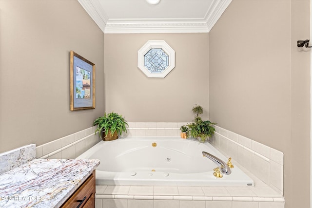 bathroom featuring crown molding, a jetted tub, and vanity