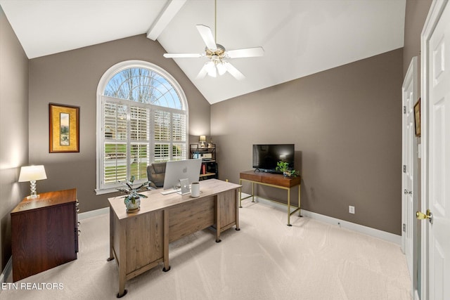 office with lofted ceiling with beams, ceiling fan, baseboards, and light colored carpet