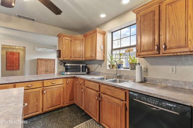 kitchen with black dishwasher, stainless steel microwave, visible vents, granite finish floor, and a sink