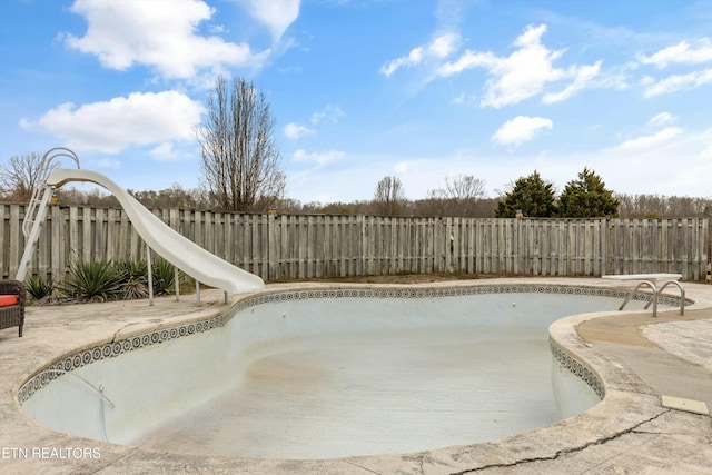 view of pool featuring a fenced backyard