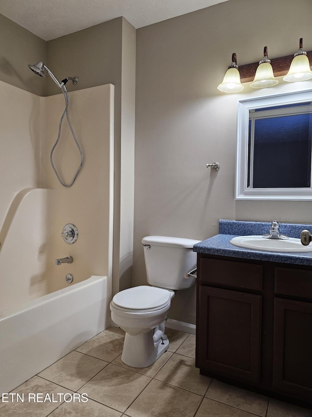 full bath with toilet, tile patterned flooring, a textured ceiling, vanity, and shower / bathing tub combination