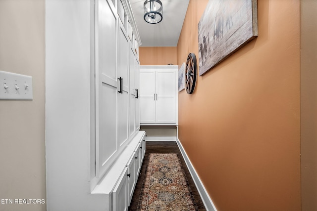 corridor with baseboards