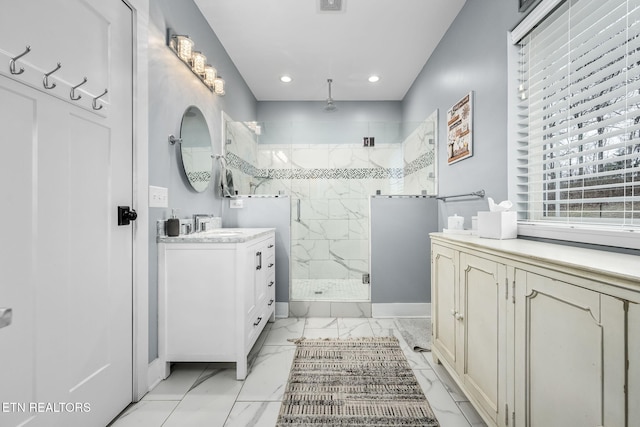 bathroom featuring a stall shower, visible vents, marble finish floor, vanity, and recessed lighting