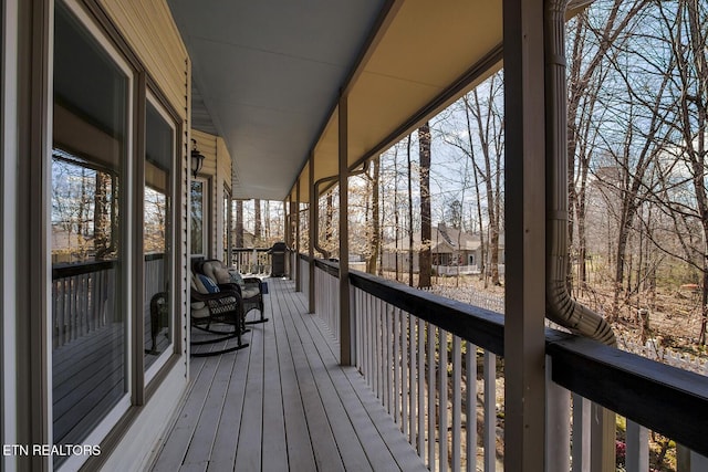 wooden deck featuring a porch