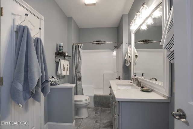 bathroom featuring toilet, shower / bath combo with shower curtain, and vanity