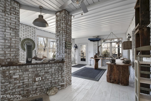 view of patio featuring ceiling fan and a porch