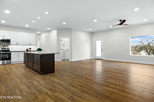 kitchen featuring appliances with stainless steel finishes, backsplash, and recessed lighting