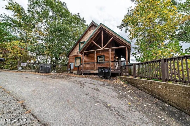 view of log-style house