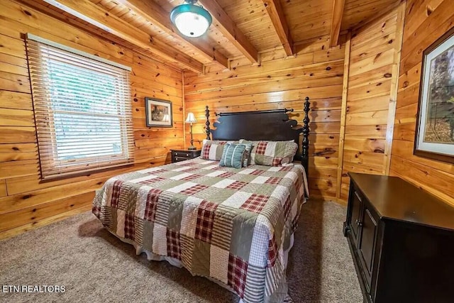 carpeted bedroom with wood ceiling, wood walls, and beam ceiling