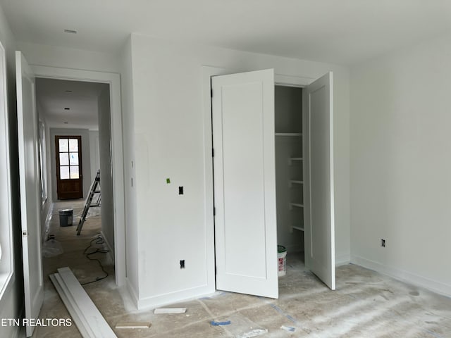 unfurnished bedroom featuring a closet