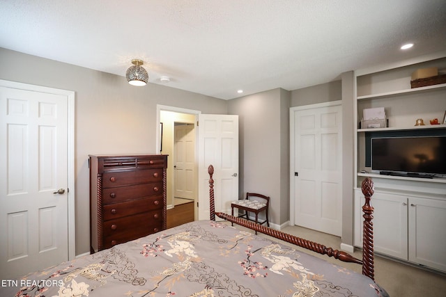 bedroom with recessed lighting