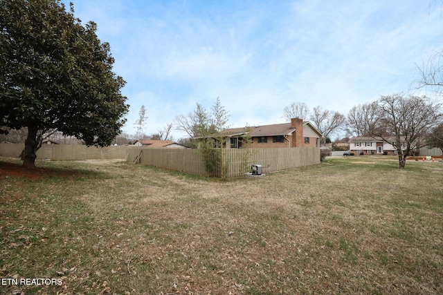 view of yard featuring fence