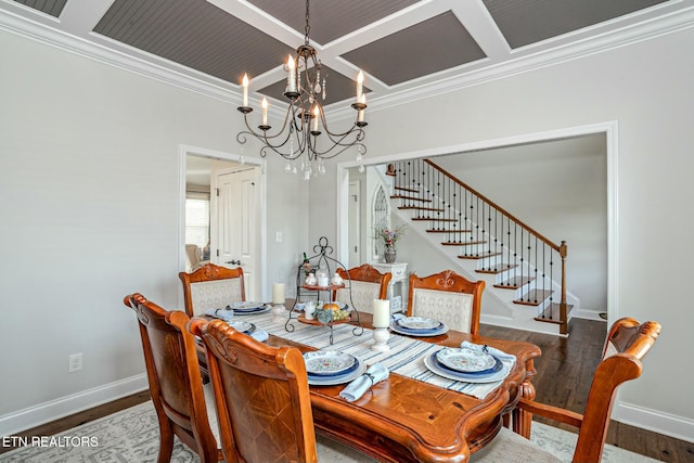 dining room with baseboards, stairway, coffered ceiling, and wood finished floors