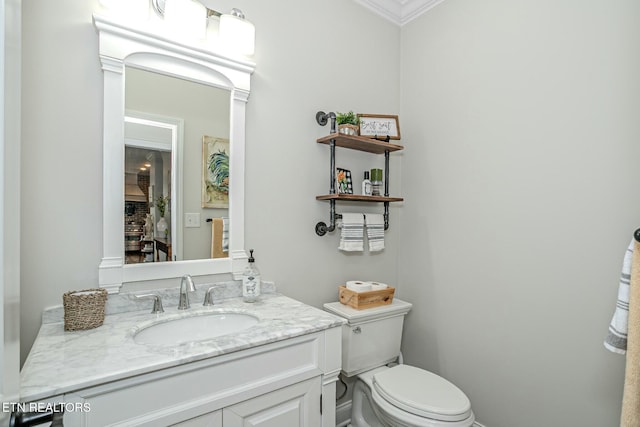 half bath with toilet and vanity