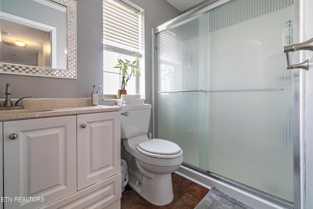 4404 Aylesbury Dr, Knoxville, TN 37918 - full bath with a shower stall, toilet, and vanity