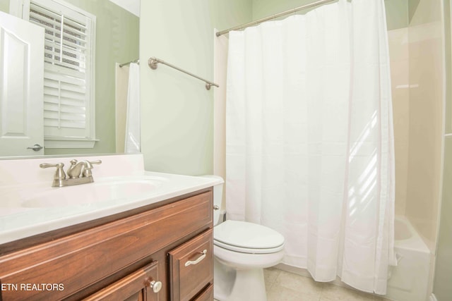 bathroom featuring shower / tub combo, vanity, toilet, and tile patterned floors