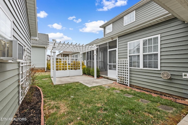 view of yard with cooling unit, a sunroom, a patio, and a pergola