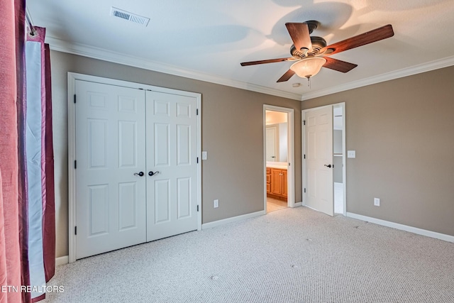 unfurnished bedroom featuring ornamental molding, visible vents, and baseboards