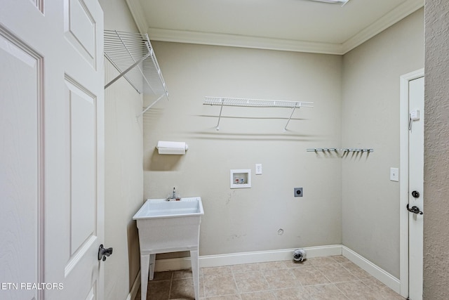 laundry area with hookup for an electric dryer, laundry area, washer hookup, baseboards, and tile patterned floors