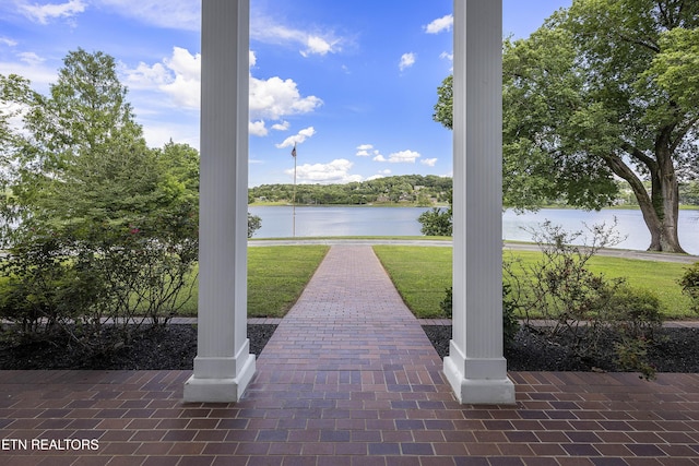 exterior space with a water view