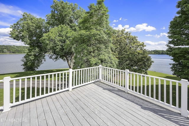 deck featuring a water view