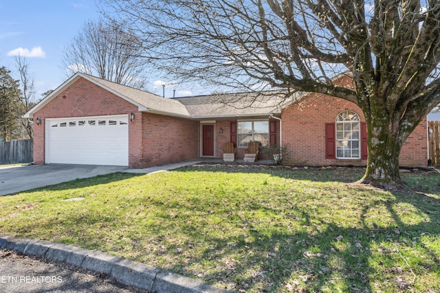 ranch-style home with fence, driveway, an attached garage, a front lawn, and brick siding