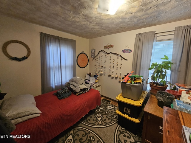 bedroom with a textured ceiling