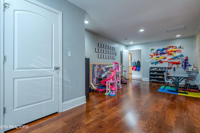 game room featuring recessed lighting, wood finished floors, visible vents, and baseboards