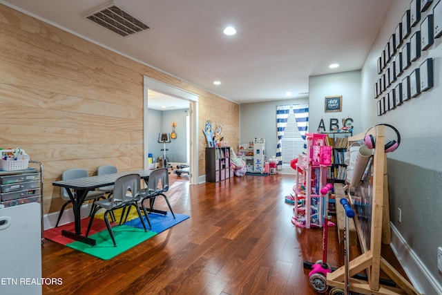 recreation room with wood finished floors, visible vents, and recessed lighting